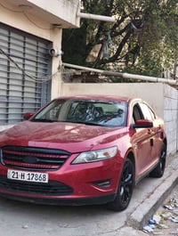 فورد تورس 2010 sel محرك v6  حجم 3500 ضررها قطعتين بونيد و باب السائق م...