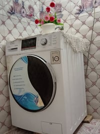 عندي هاي غساله اوتوماتيك عشر كيلوات ثلاثه ميه وبيها مجال 07509218083