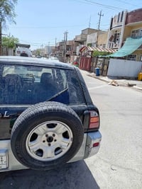 سياره مديل 1998 للبيع مكاني بغداد الشعب الرقم 07712610156