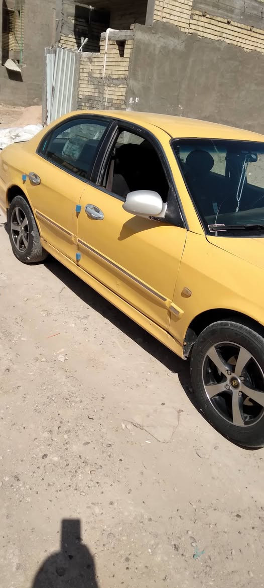 السلام عليكم سيارة هونداي سوناتا وفود للبيع موديل ٢٠٠١ بغداد اجرة رقمي للاتصال ***********
