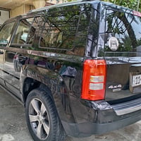 سيارة جيب باتريوت ٢٠١٦ فتحة بالسقف بيها صبغ أثر شخوط وارد أمريكي حادثه...