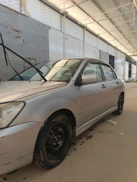 لانسر ٢٠٠٧ • كشر مصبوغ • رقم بغداد