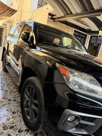 لكزز 2014 بريم رقم بغداد  ماشيه 125  سياره جديده كلش  بيها باب الصدر و...