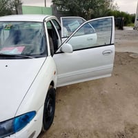 بروتون ٢٠٠٢ • رقم بغداد دولي • بدون صبغ