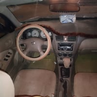 سياره للبيع نيسان سني موديل 2010 بيهه قطعتين تبديل بونيد وجاملق محرك ا...