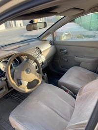 نيسان تيدا • ٢٠٠٩ • توماتيك
