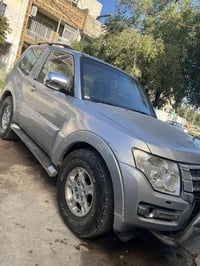 باجيرو للبيع 2008 تك باب مصبوغه عام  ب 88 وبيه مجال 07723246647