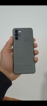 جهاز ريلمي GT ماستر للبيع فقط ذاكرة 256  رام8+8 ببجي60 فريم ضهر جلد جه...