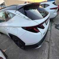 توسان • ٢٠٢٥ • ابيض