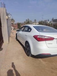 كيا سيراتو ٢٠١٤ أبيض خليجي رقم اربيل الماني وكاله تحويل بيه سونار مرفق...