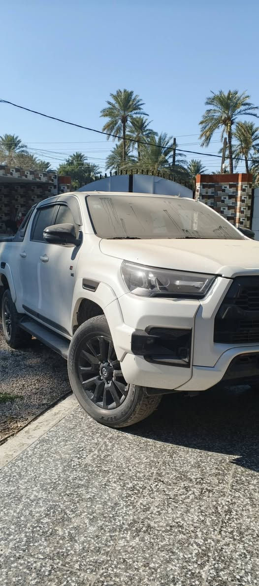 تيوتا هايلوكس2022 GRسعودي مكفوله  فول مواصفات ام المناخ رقم بغداد بسمي ماشيه 90الف السعر410وبيه مجال ***********مكاني بابل
