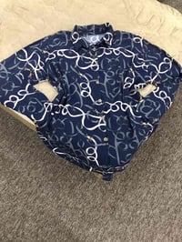 اكس لارج • ليبل • توصيل