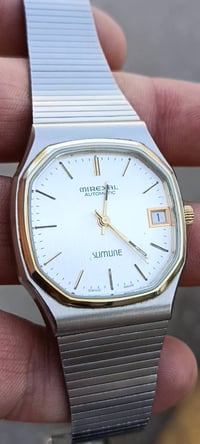 ميركسال سليم لاين • سويسري اوتوماتيك ٢١ حجر • ٣٥×٤٠ ملم