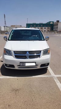 دوج كرفان للبيع او مراوس بفورتي السيارة موديلsxt 2010 رقم بغداد انكليز...