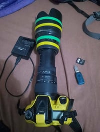 كاميرا نيكون ٧١٠٠ للبيع   ملحقاته جيلاتين اصفر  عدسة ١٨ - ١٠٥ ( العدسة...