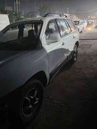 سنتافيا 2002 رقم نكليزي بغداد سيارة مصبوغة حزام جمالية حادث بس باب الس...