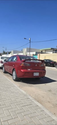 شباب عندي لانسر 2016 خليجية فول مواصفات ماشية ٥٧ كيلو فقط  بس عدي جامل...