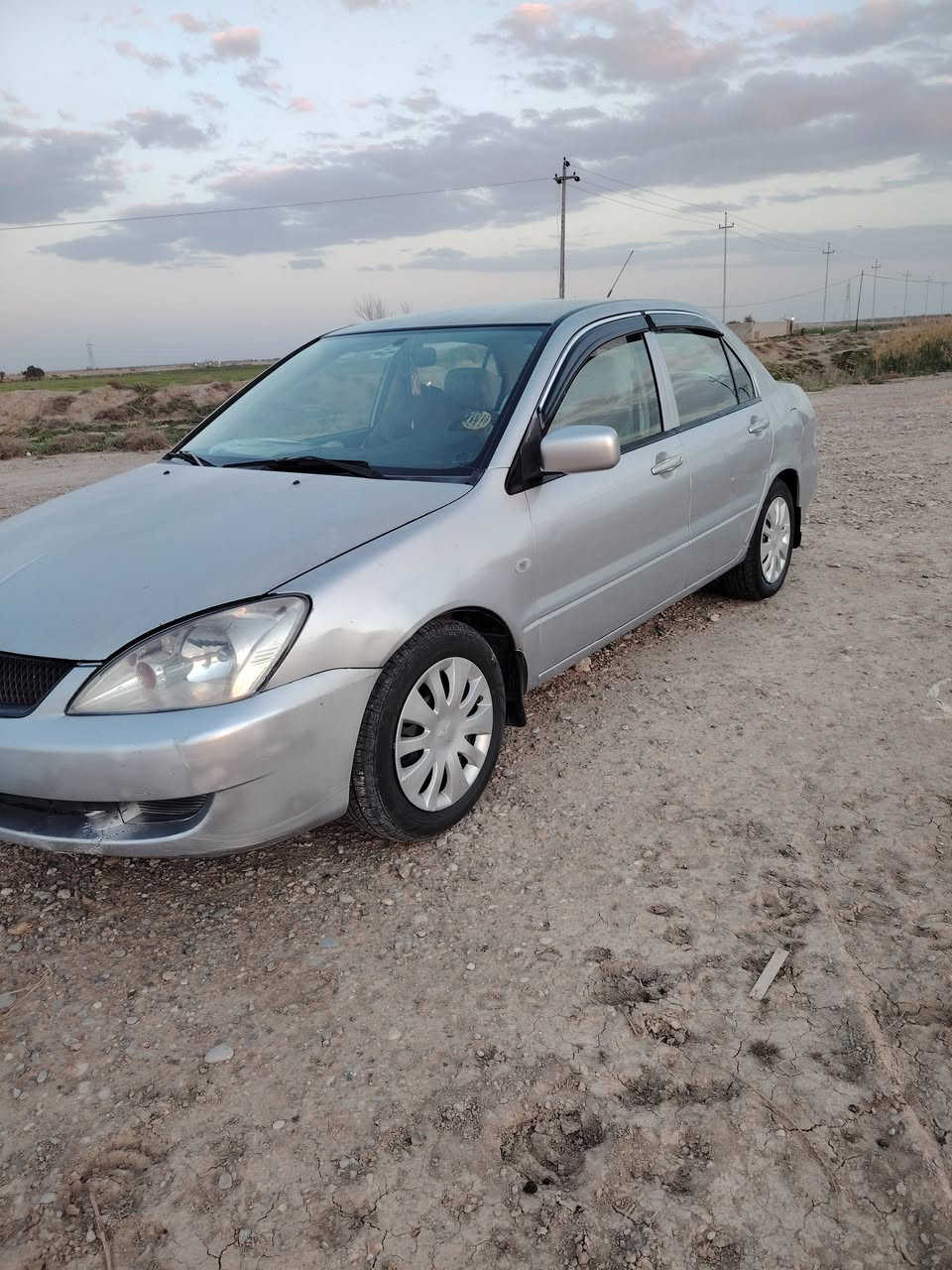 سلام عليكم لانسر 2011 للبيع رقم بغداد سنوية ما نافذة السيارة جديدة مال جناي السيارة بدون حادث بدون صبغ السونار مرفق مع الصور مكينة كير مكفولات صدر أمامي خلفي جديد تدفىة تبريد شغال تخم تاير داخل عسلي السيارة السيارة احلة من الصور كبل لشارع السعر (78) وبيها مجال مكان السيارة ديالى الشراي يتصل ***********
