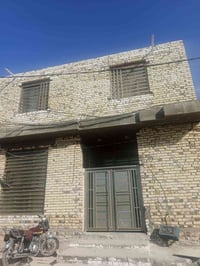 الديوانية حي العصري • ١٠٠م • بيت طابقين