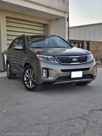 كيا سورنتو 2014 فئة SXL الجنايه يعرفه.. رقم بغداد و بسمي،، السياره مگف...