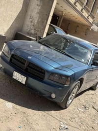 جارجر 2009 مصبوغة عام مراوس ب 12 او 13 2009  كندي حادثها جاملغ الايسر ...