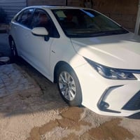 كورلا هايبرد 2025 كفالة عامة عنوان بغداد ماشية 21....السعر 158بيها مجا...