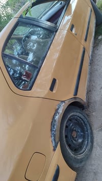 (سمند موديل ١١رقم بغداد مكفوله من الضربه من مكينه وكير وتبريد ويه السو...
