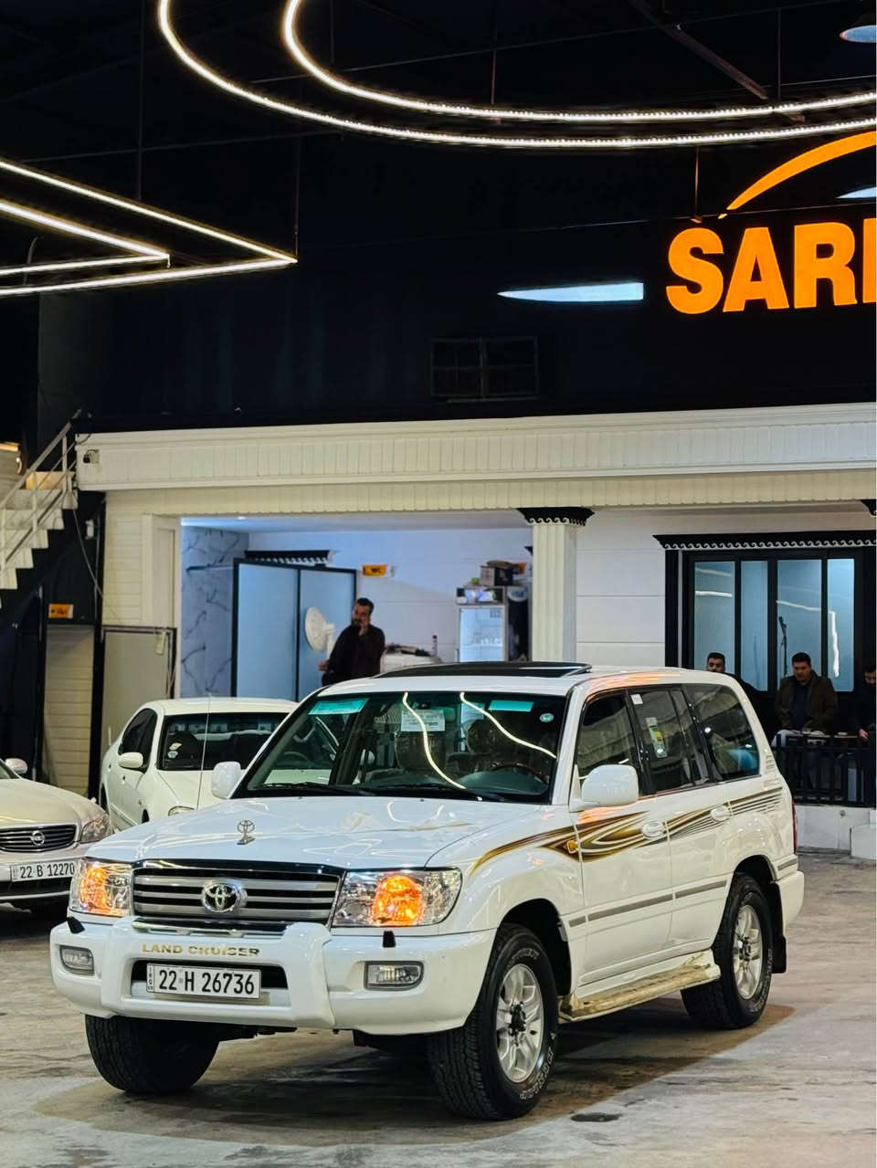 تۆیۆتا لاندکرۆز مۆدێل ٢٠٠٦ مواسفاتGXR ی فوول فوول 6پستن سەیارەکە زۆر جوان مایتەوە خاوێن و لۆکە هەمو شتی لەسەر بیلادیە مواسفاتی سلاید ناوزەرد و فۆرمیکا و تۆماتیک و سەلاجە و سێ ریز کوشن و  شاشە گەورە زۆر مواسفاتی تر سەیارەکە بێ بۆیاخە هیچ هیچی پێوە نیە گیر و مەکینە و اکسلی بەشەرتە یەک دینار مەسروفی تێدا نیە بۆ زانیاری زیاتر *********** ناونیشان کۆیە كويسينجاك, أربيل
