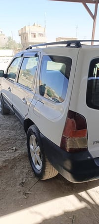 مازدا كامري • ٢٠٠٤ • باسمي