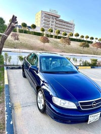 أوميغا ٢٠٠١ • جير أوتوماتيك • محرك VVT i3000