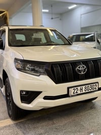 ،، تويوتا برادو Txs ابيض موديل 2023  رقم اربيل جديده جدا عداد المسافه ...