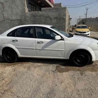 اوبترا 2010 رقم سليمانية سيارة نظيفه ومابيها نواقص بيها 4 قطع صبغ  مكا...