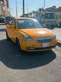 عندي سيارة اكسنت موديل 2009 خليجي  بيه بس طخه بل جاملغ الخلفي تبريد ثل...