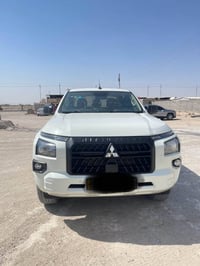 ماشيه 44 ألف سعر 290 رقم 07890350126 بيك أب مستوبيشي موديل 2025