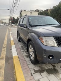 نيسان بافندر ٢٠١٠  ٧ راكب بصمة ٣ قطع تبريد منضومة غاز بيها كير محرك جي...