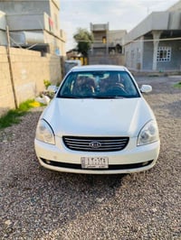 كيا اوبتيما(لوتز)2007  محرك كير شرط محرك 2400 نفس محرك السوناتا  سيارة...