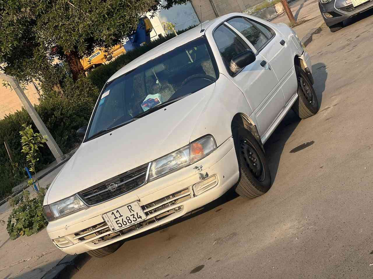 تيسان سني موديل 97 سياره بسم المالك *********** مكان السياره بغداد للتواصل مع صاحب الرقم مكلف بل نشر
