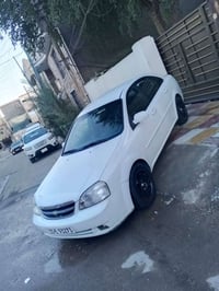 اوبترا موديل 2012 للبيع سياره حلوه رقم بغداد انكليزي مكينه كير صدر مكف...