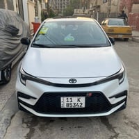 كورلا 2025 S بلاك ادشن لون صدفي رقم بغداد  محرك 1800 هايبرد HEV مري بل...