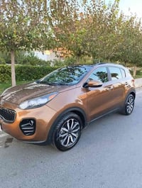 كيا سبورتج موديل 2018 … امريكي ضرر خفيف  ….لون جوزي غير محدد.. رقم بغد...