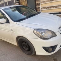 اكسنت 2011 خليجي بيه صبغ جاملغ خلفي وحافه الباب محرك 1600 وشاشه وكامره...