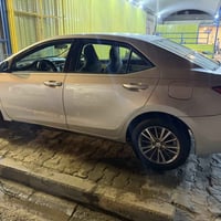 كورلا 2015 ضرر جاملغ خلفي فقط السعر 135 مع المجال 07801699966