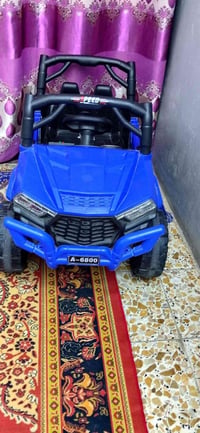 سيارة أطفال • جديدة • عمر ٢-٩