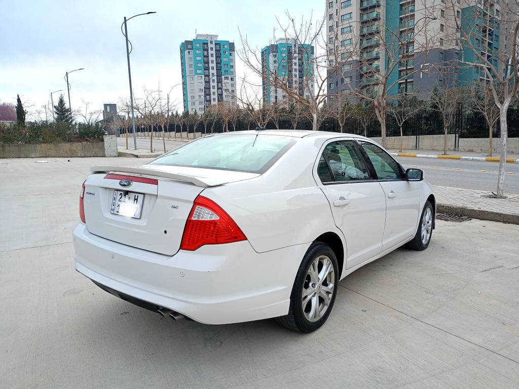 فۆڕد فیوسن 
مۆدێل ٢٠١٢ 
گێڕ ئۆتۆماتیک مواسەفات se
چوارپارچە بۆیاخ بێ ناوگرتن ڕەسمی سۆنەرم داناوە
گێڕومەکینە بەشەرت 
١٣٨ مایل حەقیقی ڕۆشتووە 
سەیارەکە زۆر زۆر تازەیە ماڵی دۆستە 
سەنەوی تازەیە  
قفڵی ٨٨ گەڵایە بۆ معامەلە تەلەفون مەکە تکایە 
*********** السليمانية, العراق
