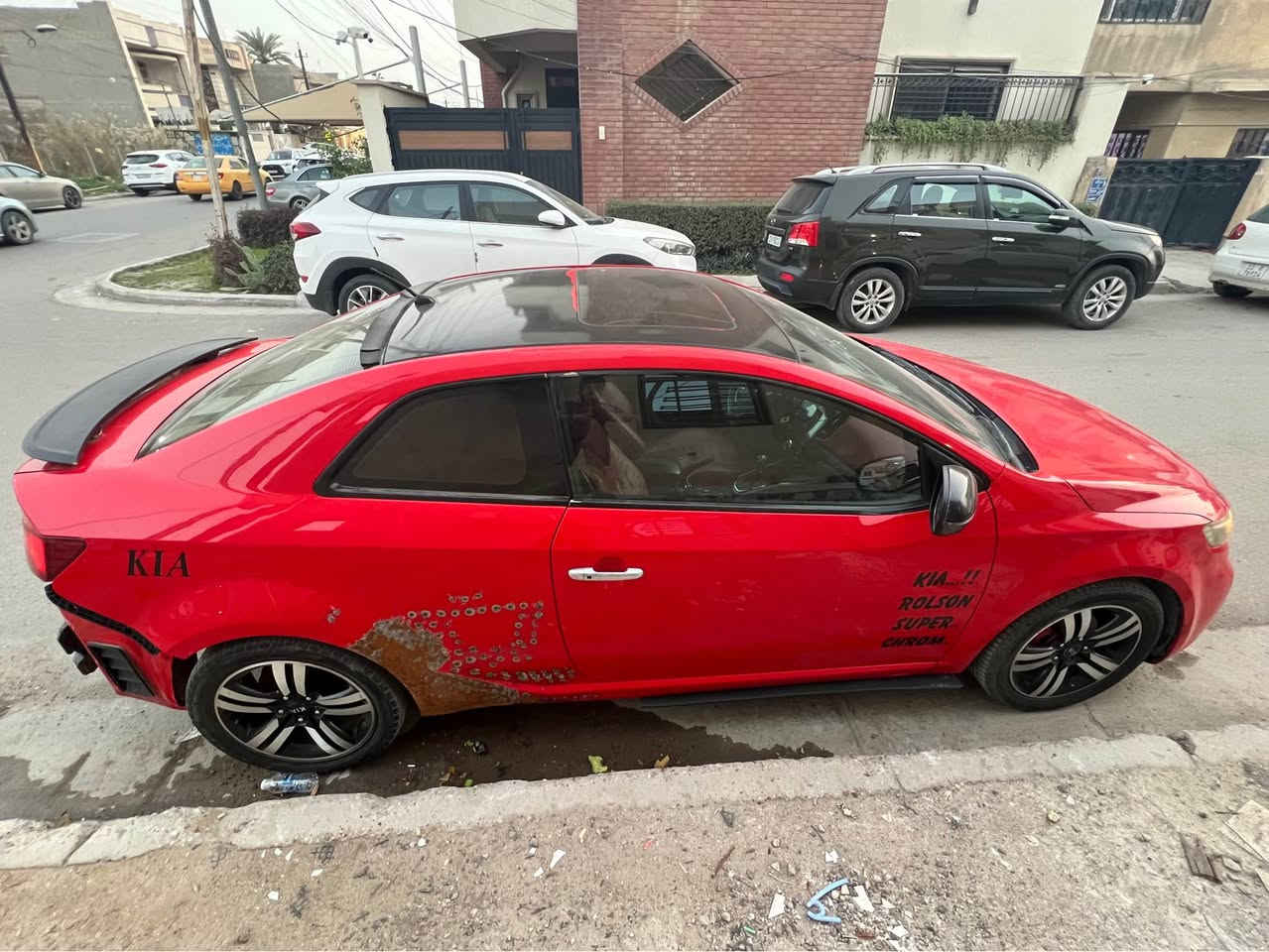 بسم الله 
كيا سيراتو خليجي 2012 كوبيه (تك باب) 
محرك 2000 دوش
فول اوبشن 
فتحه ، داش كام ، كامره خلفيه ، شاشه ، اشاير مري ، تحكم ستيرن ،شفتات ، بصمه ابواب ، بصمة تشغيل 
جاملغ امامي عكس السايق / جاملغ خلفي خلف السايق 
وبالجديد صار بيها هذا الحادث يمي مثل ما موضح بالصوره مصلحه بس بعدني ماصابغها
بدون لا لغد لا شواصي 
80$ وبيها مجال 
مكان السياره بغداد نفق الشرطه
 ‭0790 234 2755‬ واتس او اتصال بغداد, العراق
