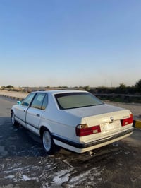 للبيع او مراوس حسب القناعه بي ام 735 مديل 1990  رقم بغداد الجديد سياره...