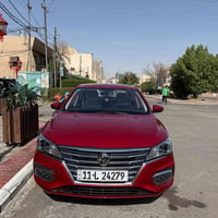 اللون الاحمر دم الغزال  MG5 موديل2024  ضمان5 سنوات ( محرك وكير و كهربا...