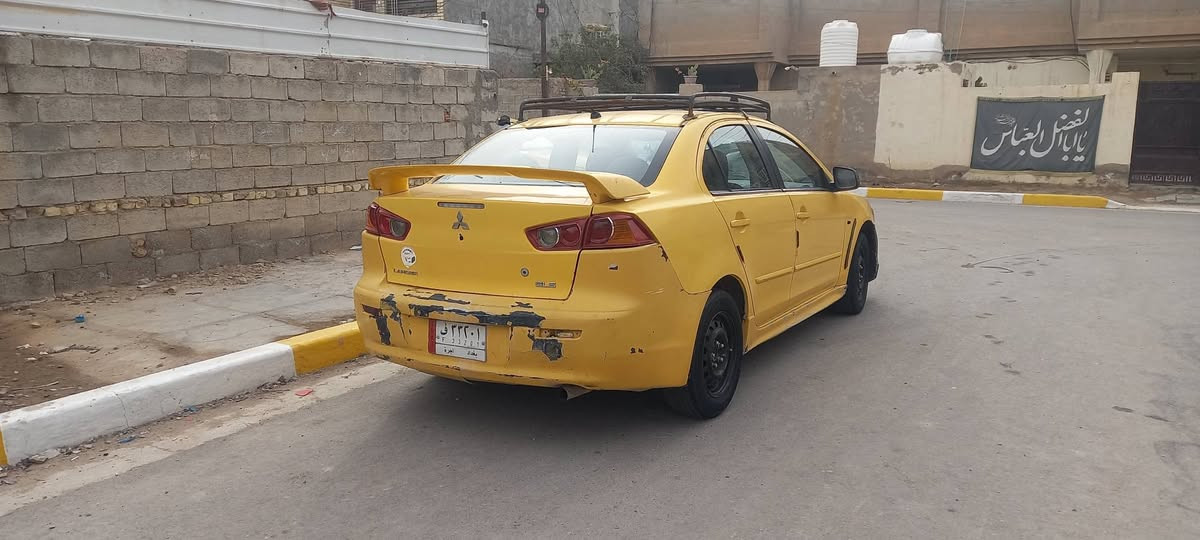 سلام عليكم لانسر قرش 2009 خليجي فول بصمه نضام ترحيب 
محرك 2000 كير ومحرك مكفولات تخم تاير جديد لبارحه شديته سياره يحتجلهه صبغ وجيبلهه اربع بيبان ودعميه خلفيه نفس لون سياره جدد انطيهن ويه سياره سعر 60 وبيهه مجال *********** بغداد, العراق
