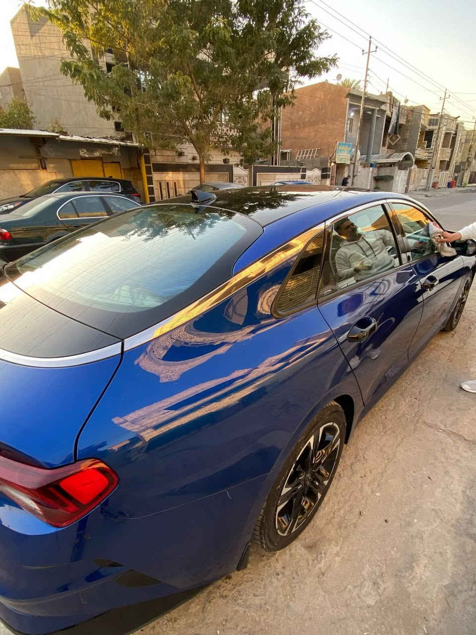 Kia K5 2022 GT-LINE 
كي فايف k5 2022
موصفات GT line 
فول الفول على الاخير  موصفات 
 1_بانوراما 
2بصمه 
3سايد بريك بصمه
5مثبت سرعه
6نضام ABS
7مانع انزلاق
8حساس  اطارات 
9بك لايت لد
10شاشه كبيره لمس
11كامره دواره
12كشافات اماميه 
13شاشه عطال 
14ويل كروم 
15ردار جانبيه 
16مراقبه نقطه العمياء 
17ردار الخطوط البيضاء  ردار امامي وخلفي وجوانب السياره 
18شاير  با المري 
19كشنات جلد اسود
20مقعد ساق كهرباء 
22نضام قياده خمس وضعيات 
23بلوتوث +usb+auX
24فول تحكم ستيرن 
25كير اوتو +عادي 
26نوتو بريك 
27الخريطه 📍
 28 زنود + ليد 
29نوتو هولد
30التشغيل عن بعد  
‏AOTO HULD 31
32تصميم خارجي رياضي 
33نضام المحلاحه
34مصابيح الخلفيه LED
35مصابيح ضباب LED
36محرك تيربو 1600
37السيارة رقم بغداد الجديد بسمي 
تشغيل عن بعد اطفاء عن بعد 
قيادة ذاتيه اربع قيادات بيها 
حادثها مثل مموضح بل صورة فقط دعاميه وبنيد بسيط وبالعراق صار بيها هلال الجاملغ الخلفي مصبوغ ومن امريكا التكمه العكس السايق كلير ونص الباب الخلف السائق صبغ

 
 يتوفر لدينا شحن الى الامارات وتركيا   
خدمة التخليص الكمركي والنقل الى جميع محافظات العراق من جميع منافذ العراق الحدودية  

للتواصل *********** بغداد 
*********** دهوك
*********** دهوك
00905348133355 تركيا 
العنوان : بغداد / البلديات / قرب جسر 7 نيسان  
دهوك / شارع بهار ستي / داخل المعارض / معرض رشيد سعيد 
#مزاد_هايدرا
