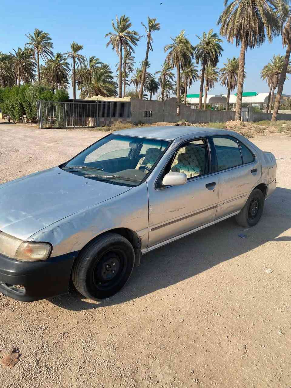 سني موديل ٩٥ رقم بغداد محرك وكير حاويه قبق اسود كير اوتو صدر جديد بس نقص مشط بدون صبغ محور يسره التبريد نقص كمبريسر السعر ٢٧ وبيه مجال المكان بغداد ابي غريب الاتصال ب*********** 
***********
